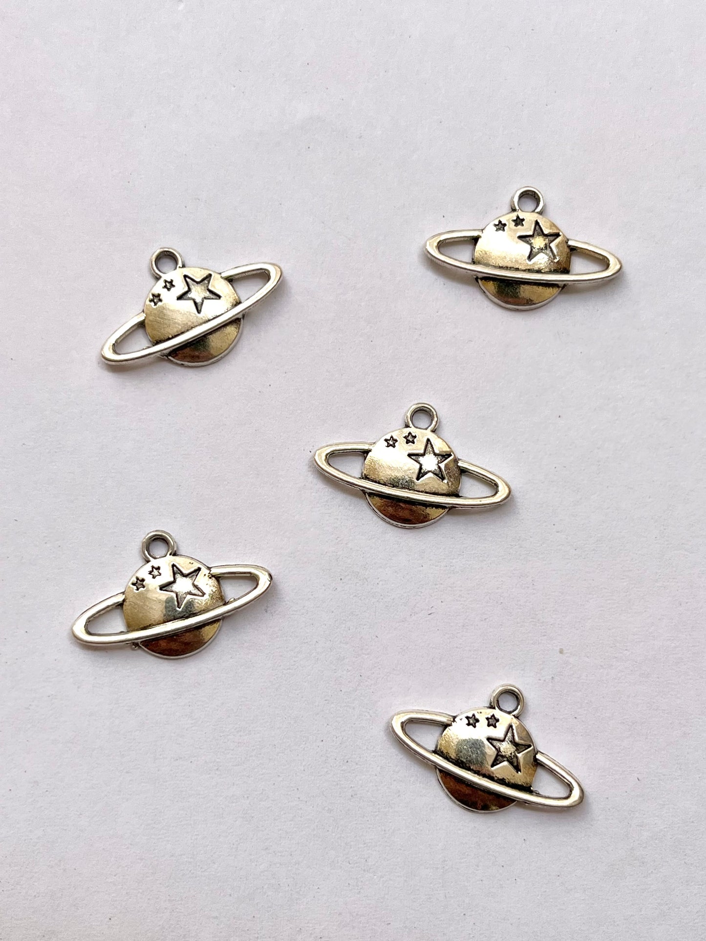 Saturn charm