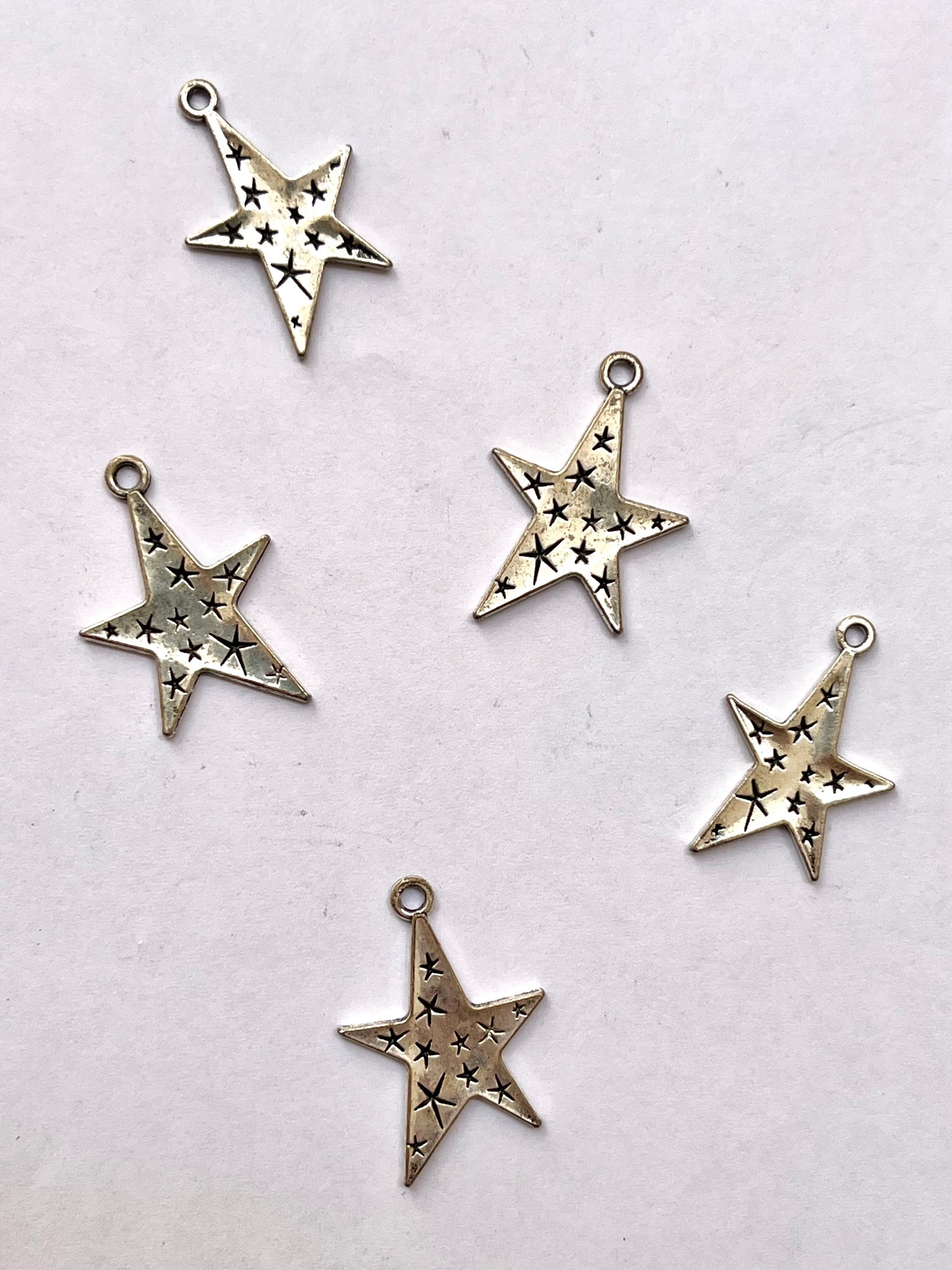 Irregular star charm