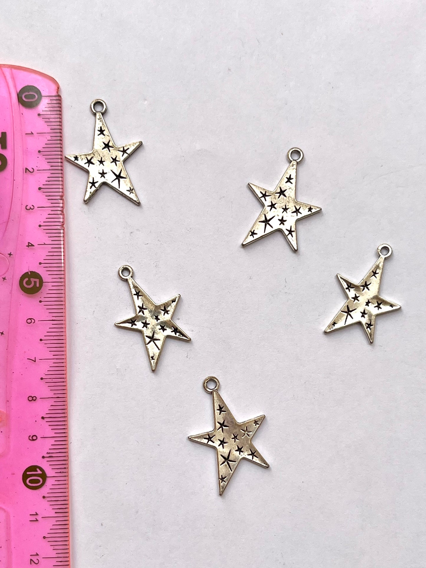 Irregular star charm