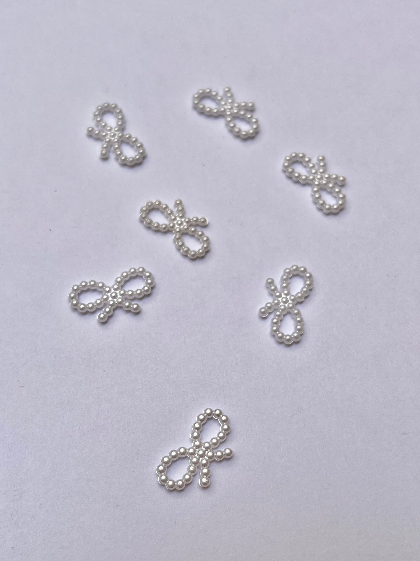 Puffy pearl charms