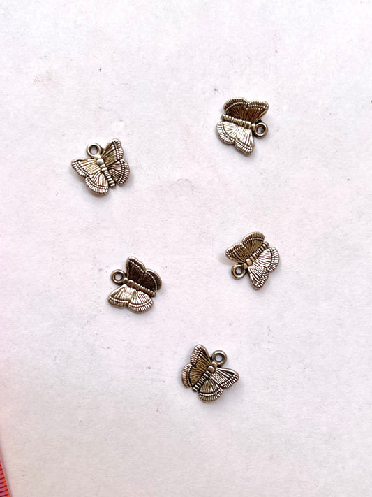 Silver butterfly charm
