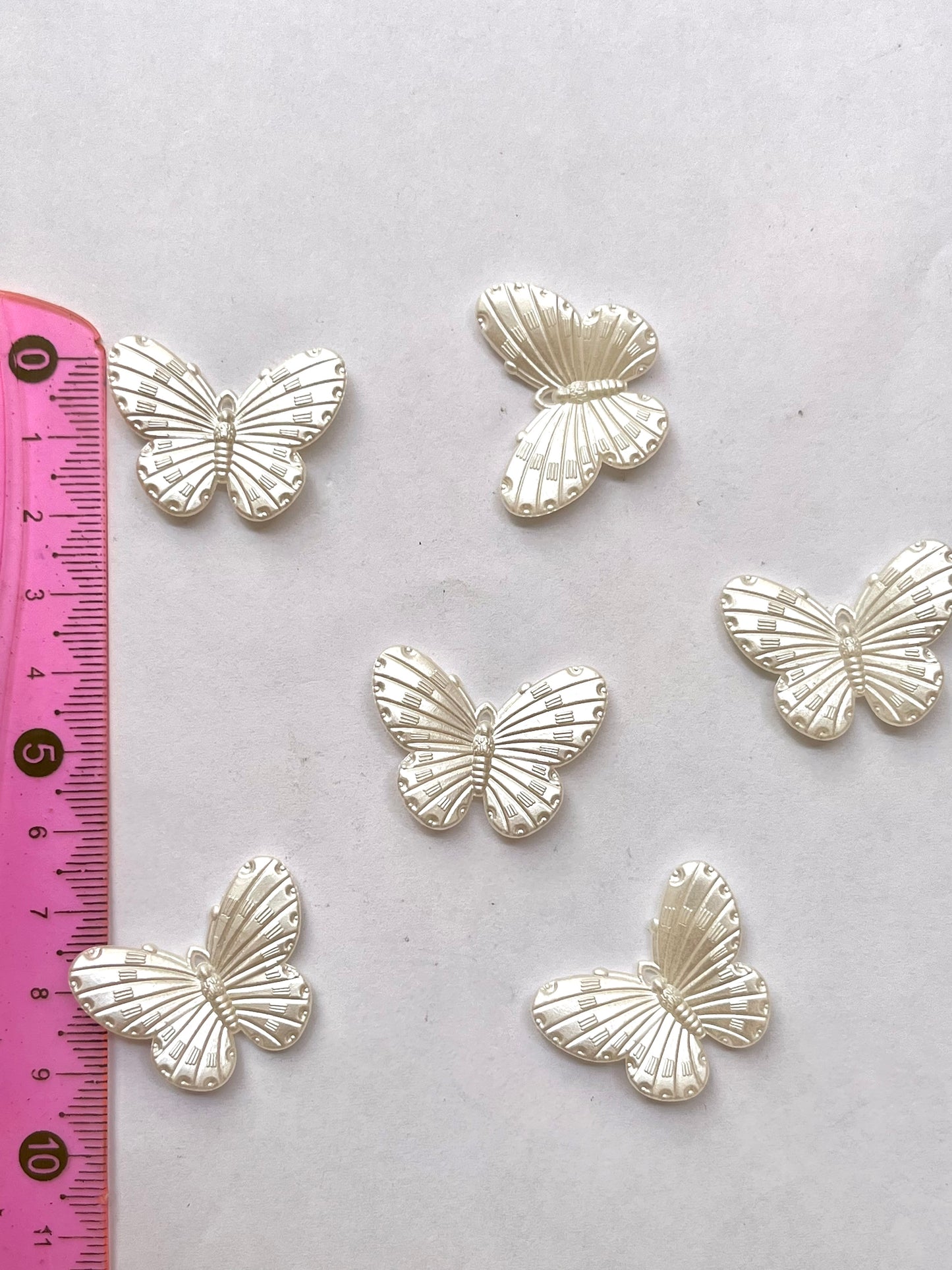 Pearl butterfly charm