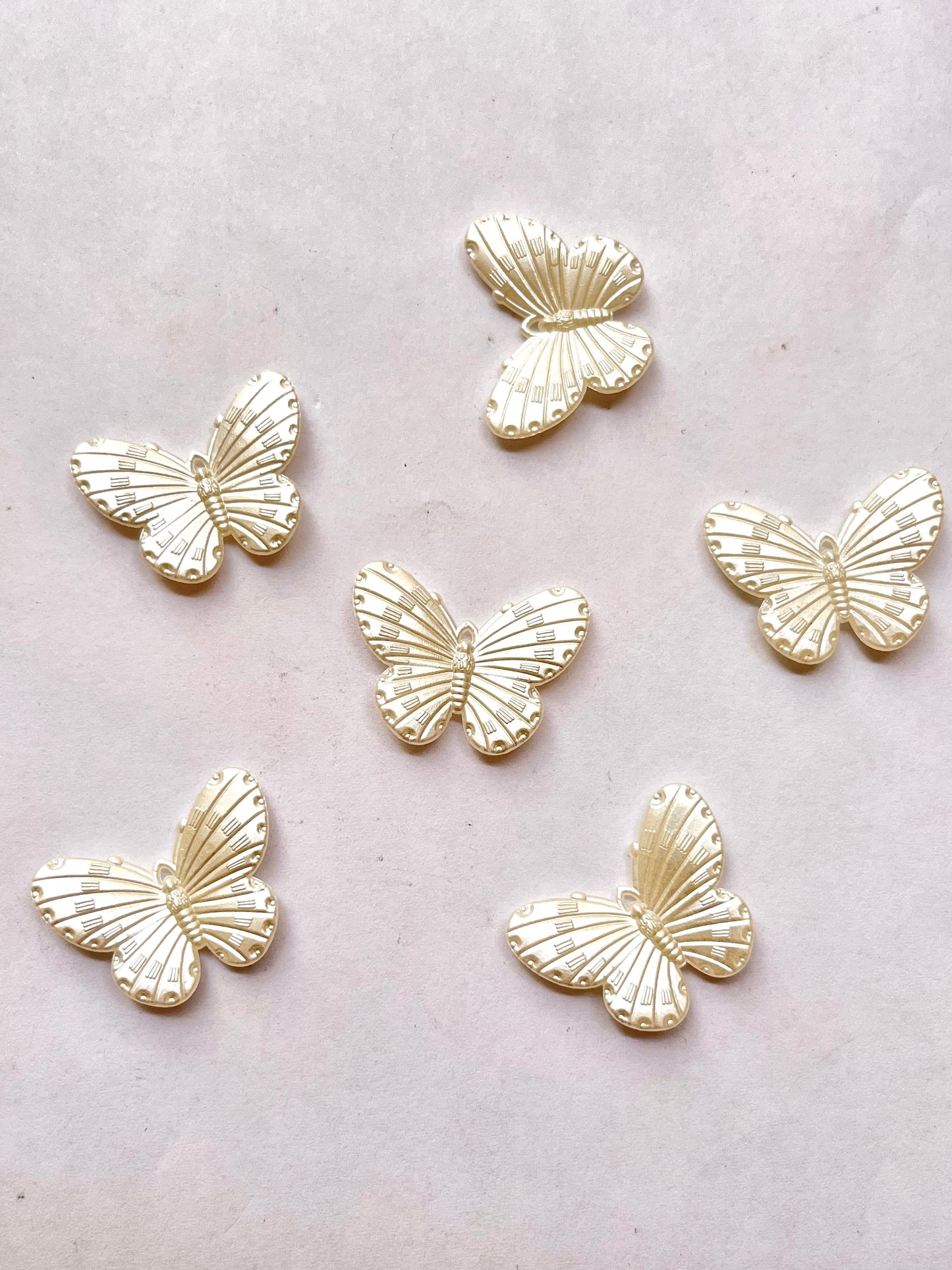 Pearl butterfly charm