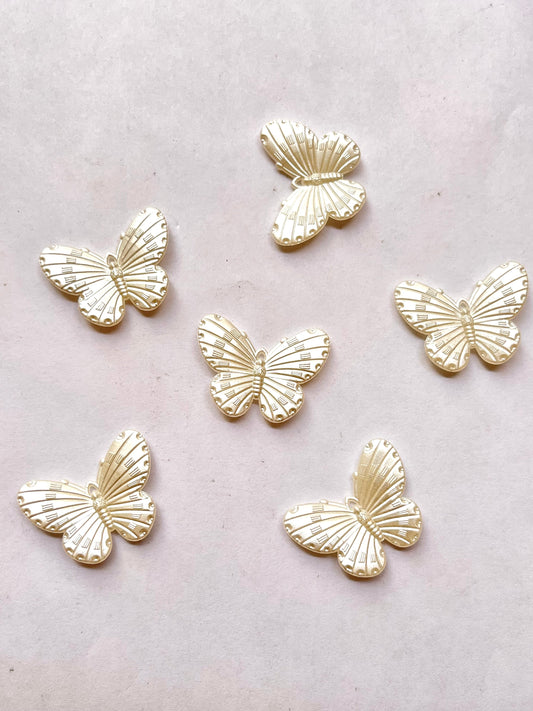 Pearl butterfly charm